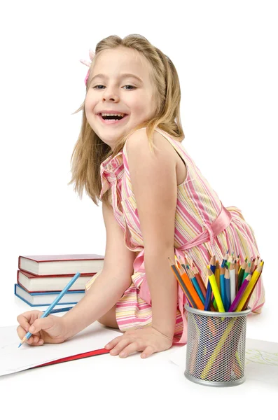 Küçük bir kız ile kalemler yazma — Stok fotoğraf
