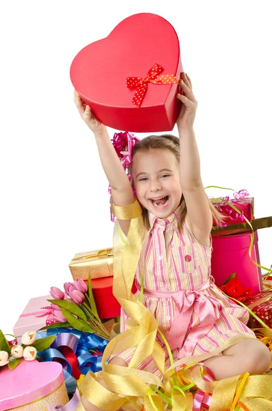 Viering concept met meisje en giftboxes — Stockfoto