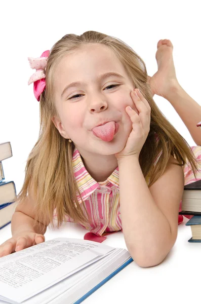 Beyaz kitapları ile küçük kız — Stok fotoğraf