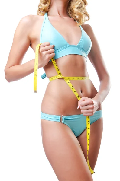 Young lady with centimetr in weight loss concept — Stock Photo, Image