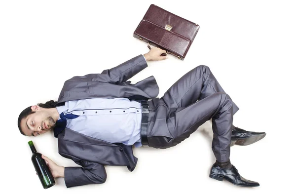 Pijany biznesmen na podłodze — Zdjęcie stockowe