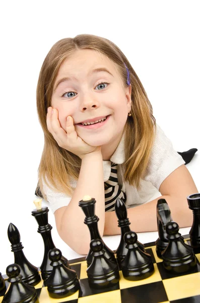 Ragazza carina giocare a scacchi su bianco — Foto Stock