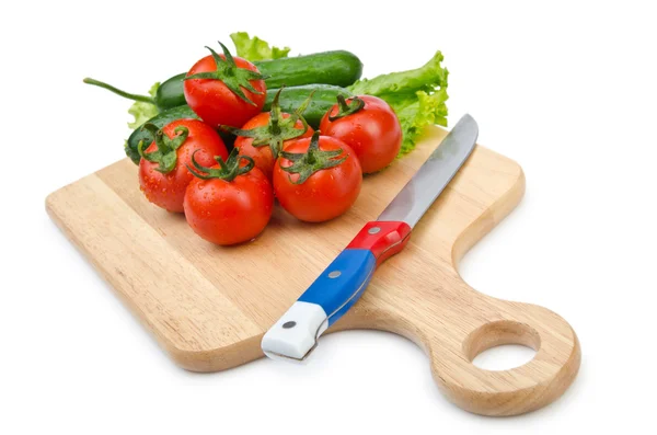 stock image Tomatoes and cucumbers on white