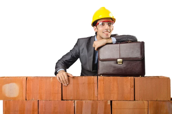 Businessman near brick wall — Stock Photo, Image