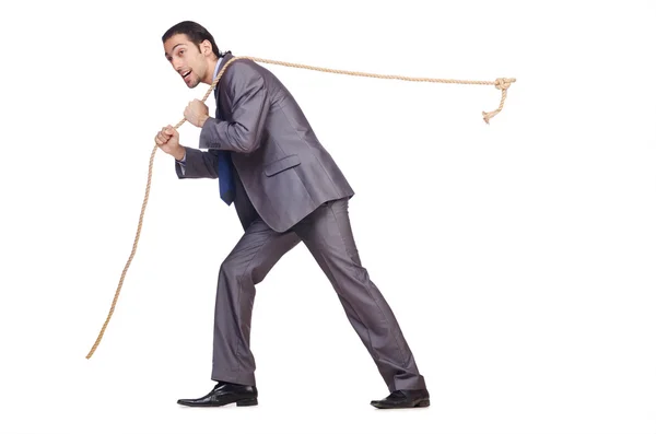 Uomo d'affari tirando corda sul bianco — Foto Stock