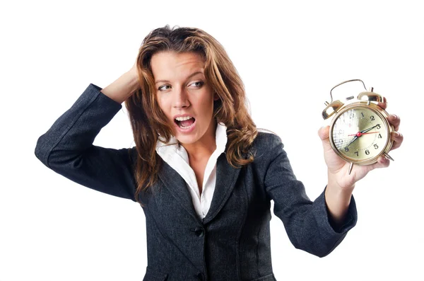 Businesswoman with alarm clock on white — Stock Photo, Image