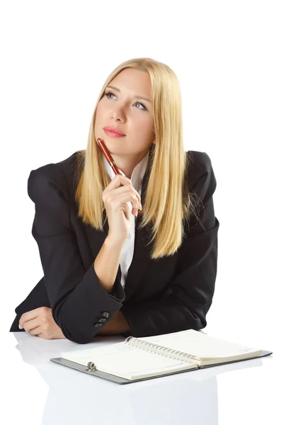 Affärskvinna som sitter vid skrivbordet — Stockfoto