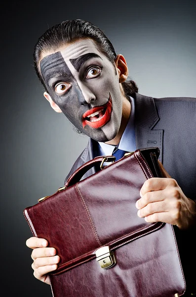 Zakenman met clown gezicht schilderen — Stockfoto