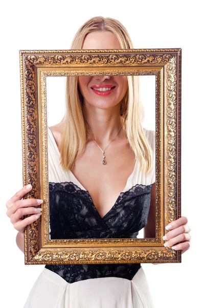 Mladá žena s rámečkem na obrázek na bílém pozadí — Stock fotografie