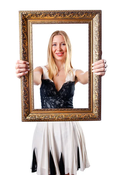 Young woman with picture frame on white — Stock Photo, Image