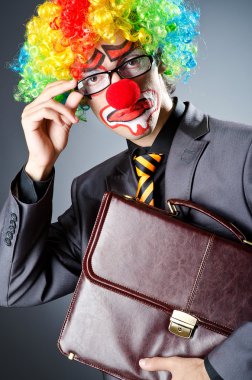 Businessman with clown wig and face paint clipart