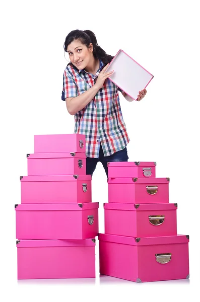 Flicka med stack på giftboxes på vit — Stockfoto