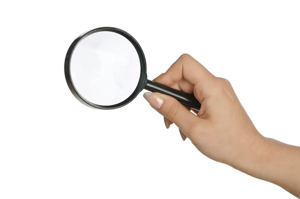 Hand holding magnifying glass on white — Stock Photo, Image