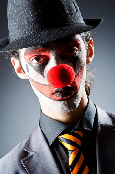 Бізнесмен з клоуном і фарбою для обличчя — стокове фото
