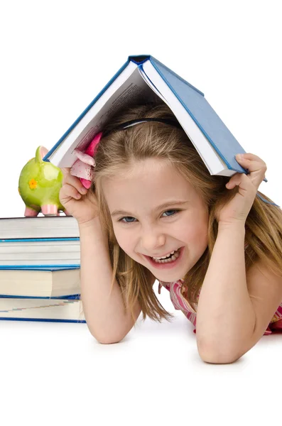 Маленька дівчинка з книгами на білому — стокове фото