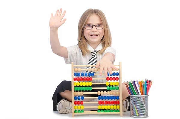 Meisje met abacus op wit — Stockfoto
