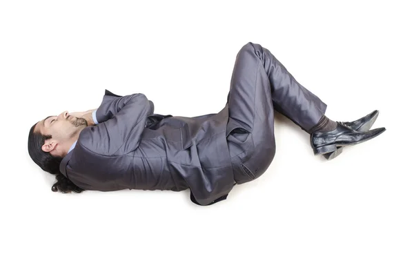 Мертвий бізнесмен на підлозі — стокове фото