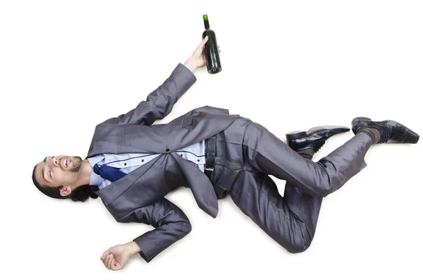 Pijany biznesmen na podłodze — Zdjęcie stockowe