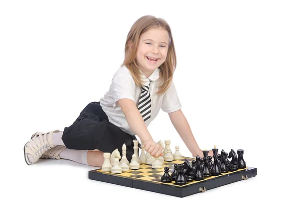 Jolie fille jouant aux échecs sur blanc — Photo