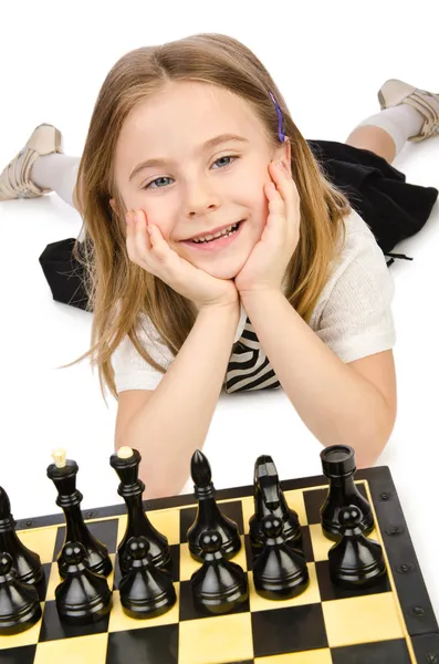 Aranyos lány fehér sakk játék — Stock Fotó