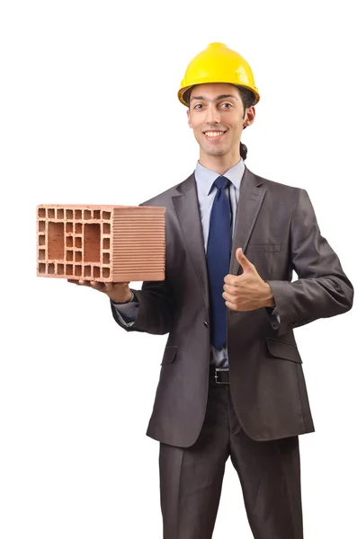 Businessman with bricks on white — Stok fotoğraf