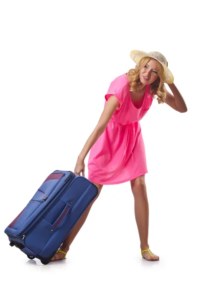 Привлекательная женщина с чемоданом на белом — стоковое фото