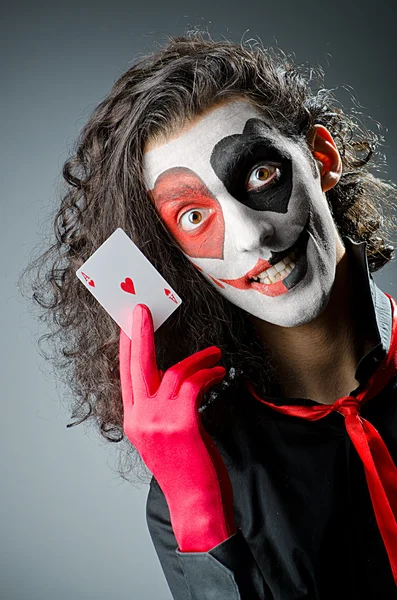 Joker met gezichtsmasker in studio — Stockfoto
