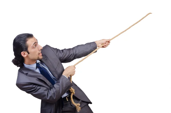 Empresário puxando corda no branco — Fotografia de Stock