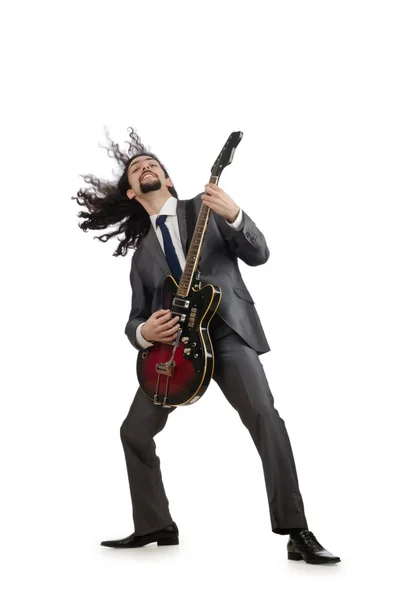 Gitara gracz w garniturze na biały — Zdjęcie stockowe