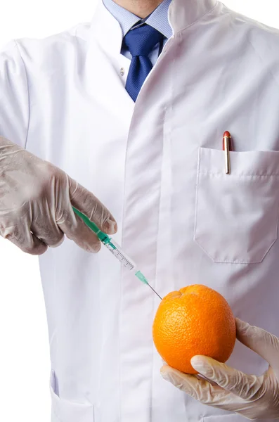 Vitenskapelig eksperiment med oransje og sprøyte – stockfoto