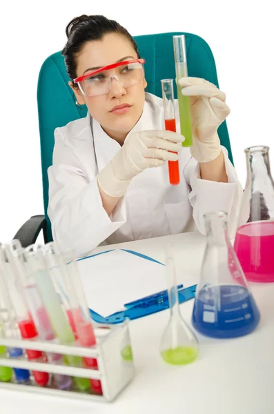 Female chemist in studio on white Stock Photo