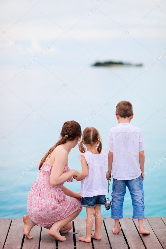 Mother and kids on tropical vacation