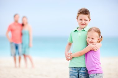 Family at beach clipart