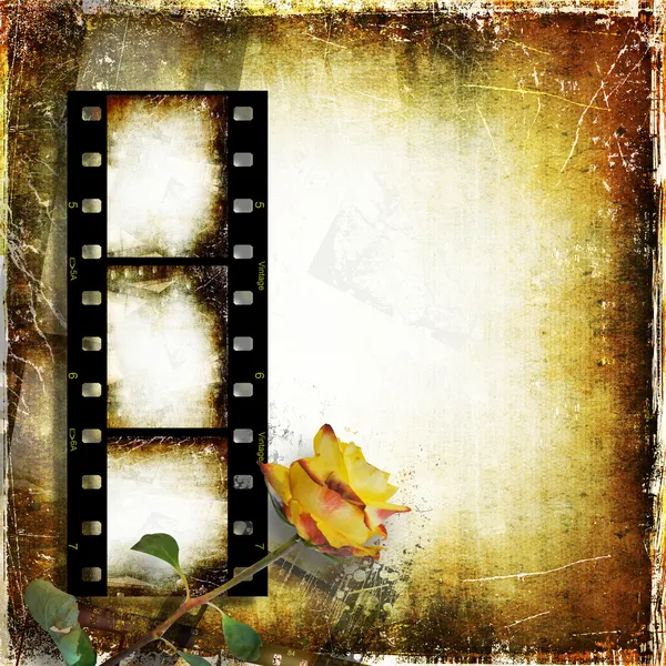 Vintage background with film strip and roses — Stock Photo, Image