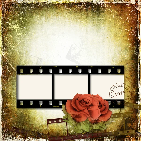 Grunge background with film frame and roses — Stock Photo, Image