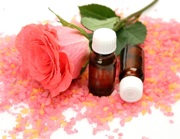 Pink rose and aromatic oil — Stock Photo, Image