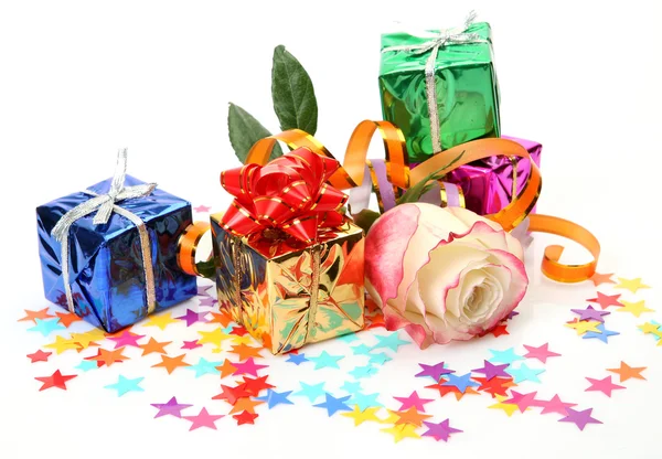 Rose and gifts — Stock Photo, Image