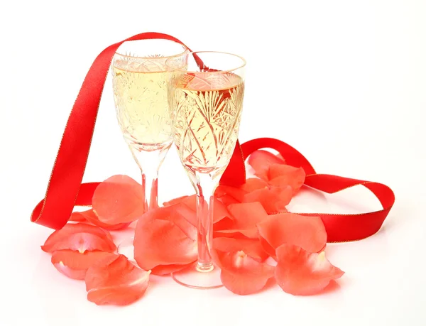 Wine and petals of roses — Stock Photo, Image