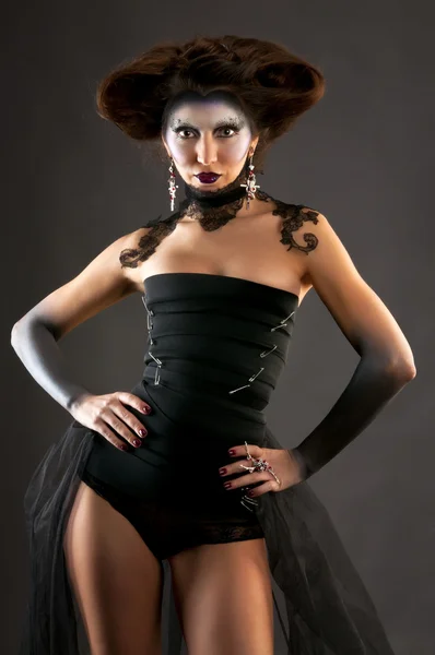 Beautiful brunette with Gothic make-up — Stock Photo, Image