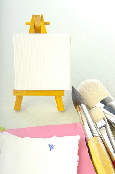 Blank art board, blank paper and brushes — Stock Photo, Image