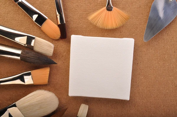Canvas and brushes — Stock Photo, Image