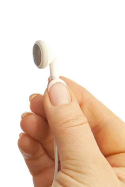 Bílá sluchátka v hannd izolované na bílém — Stock fotografie