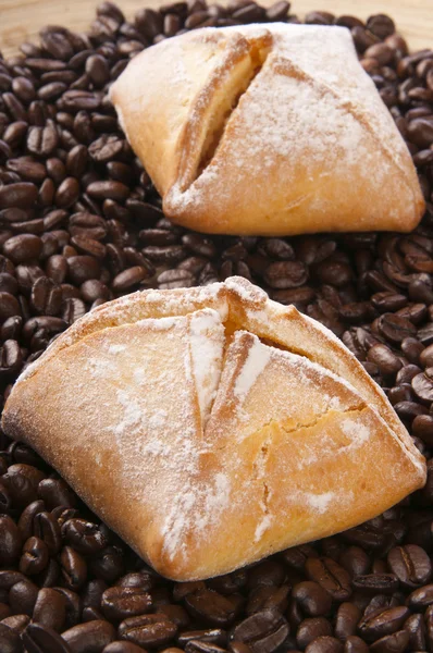 Bun on coffee background — Stock Photo, Image