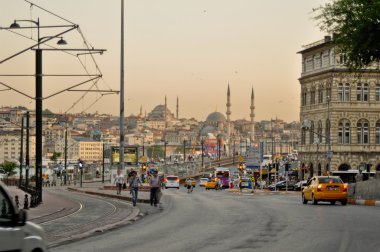 ISTANBUL, TURKEY - JUNE 04: Galata Bridge across the Golden Horn. View from Galata district at the road to Yeni Cami on June 04, 2012 in Istanbul, Turkey. Galata Bridge is a link between two districts clipart