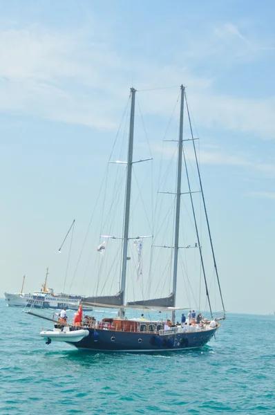 stock image ISTANBUL - JUNE 03: Sailing boat sails to Europe in Bosporus on June 03, 2012 in Istanbul.