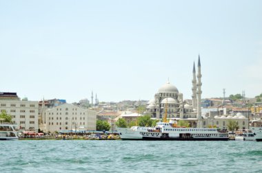 Cruise ferries in Eminonu Port near Yeni Cami on June clipart