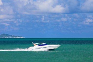 Speed boat sailing in the summer sea