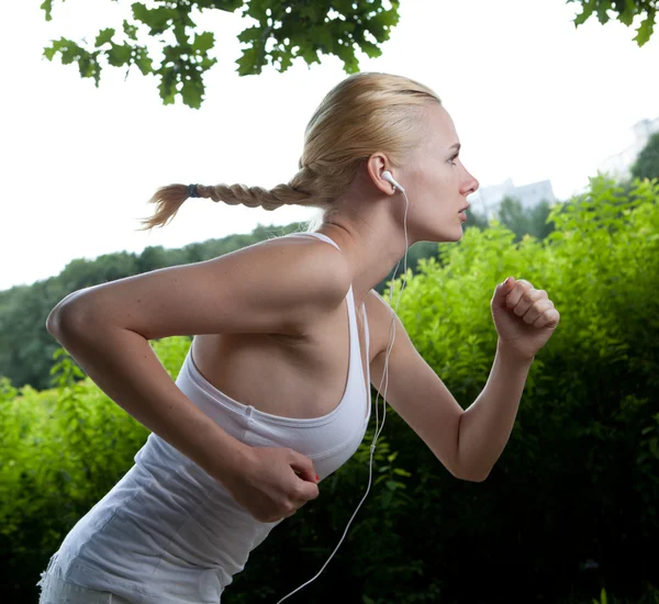 Running woman in park — Stock Photo, Image
