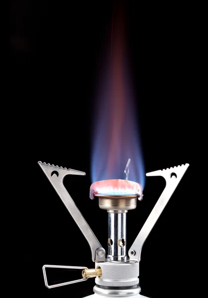Flames of gas stove in the dark — Stock Photo, Image
