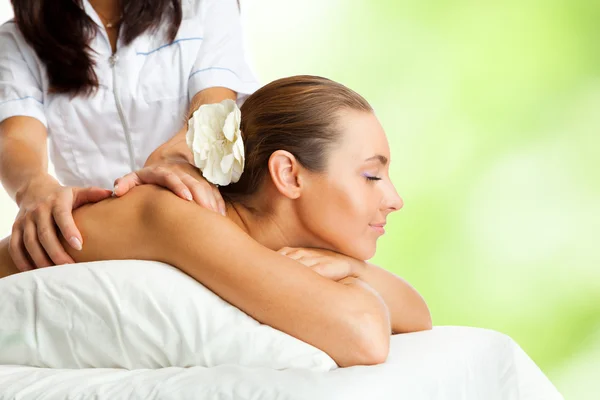 Beautiful woman at massage procedure — Stock Photo, Image